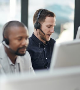 Shot of call centre agents working in an office